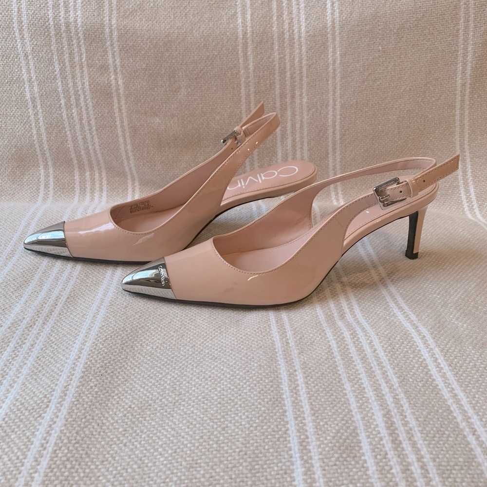 Calvin Klein ‘Reina’ pale pink slingback heels. Size 6 with 2 1/2 inch heel.